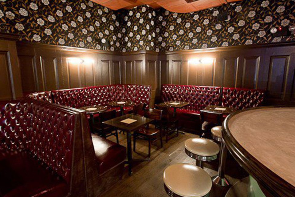 This is a booth on the 2nd floor of Hotel Chantelle in the Lower East Side